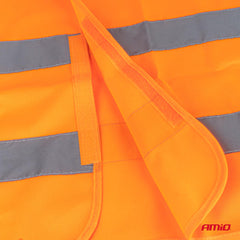 Detalj av reflexband på orange reflexväst